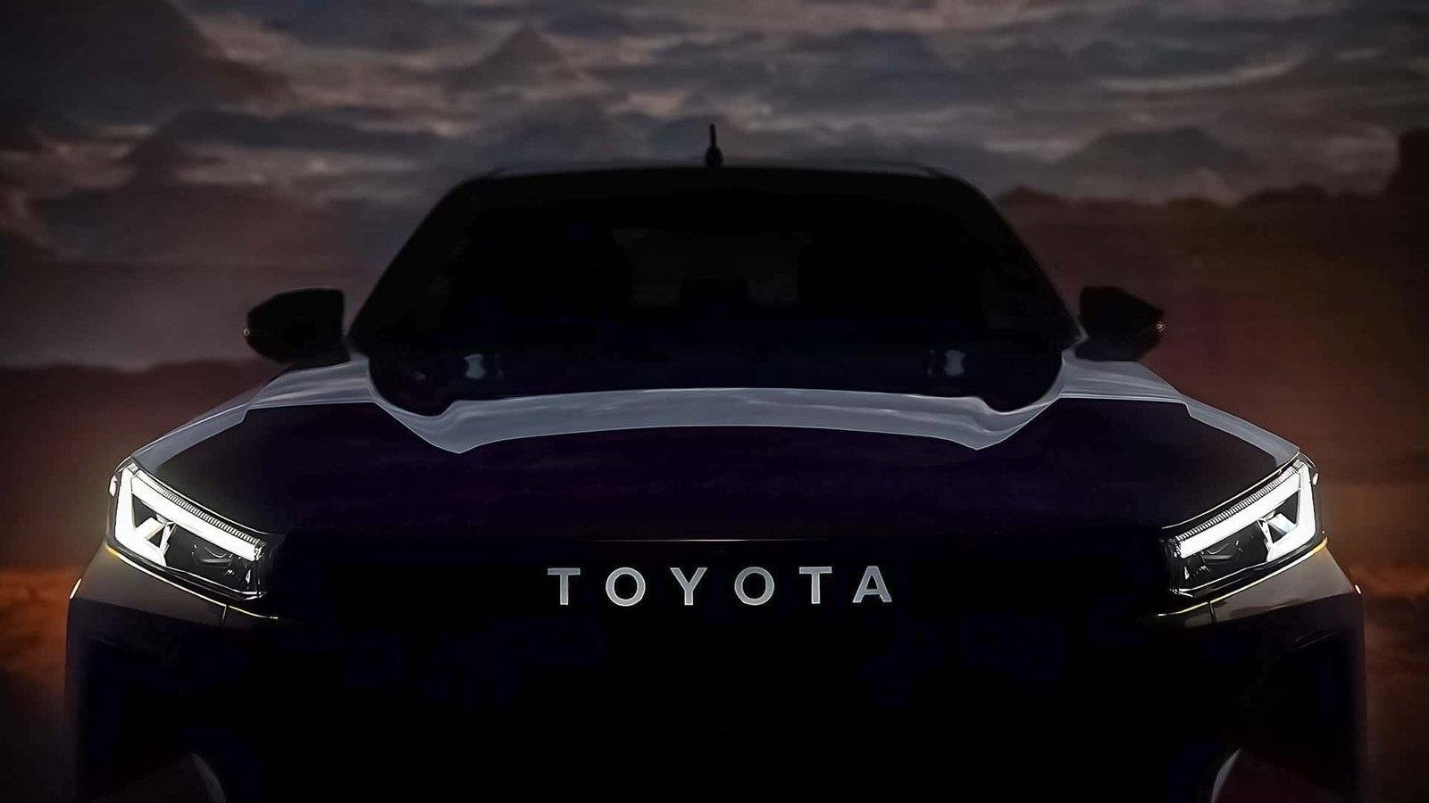 The new Toyota Hilux (2026) is shown in the first teaser image